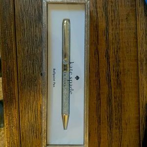 Kate Spade ballpoint pen. White glitter with gold details. Never opened